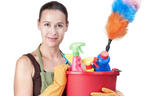 Professional office cleaners working in a Hampstead workspace
