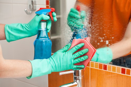 Professional carpet cleaner in Hampstead restoring a living room carpet