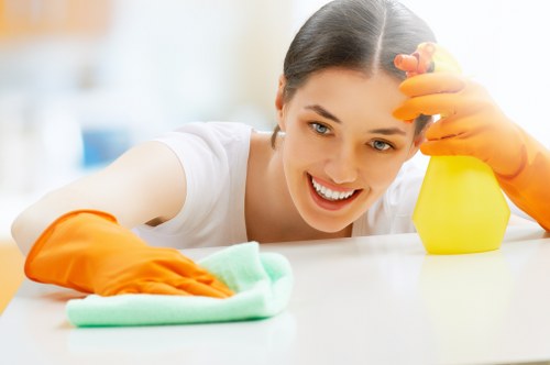 Technician using deep carpet cleaning equipment in Hampstead