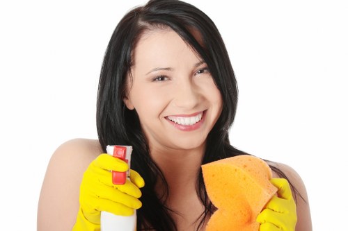 Office cleaner in Hampstead preparing a workspace
